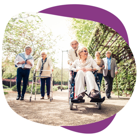 mature-adults-walking-down-a-paved-path